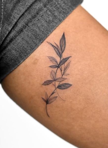 Intertwining Leaf Arm Tattoo