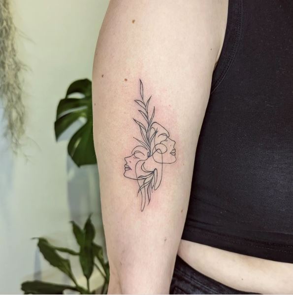 Leaf Tattoo with Fluid Line Faces