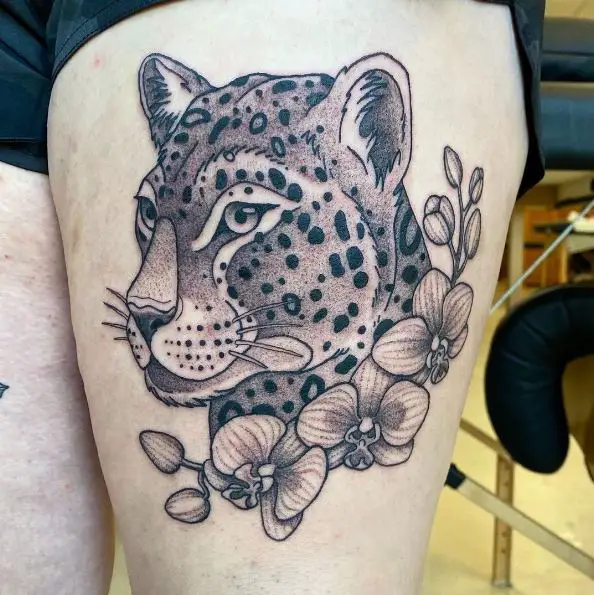 Leopard and Orchids Flowers Thigh Tattoo