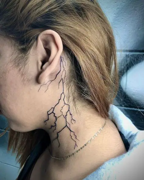 Lightning Strike Tattoo Coming Down From Behind the Ear