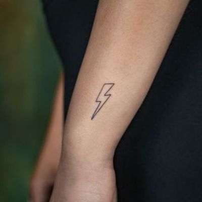 Simple lightning bolt tattoo on wrist  Bolt tattoo Lightning bolt tattoo  Finger tattoos