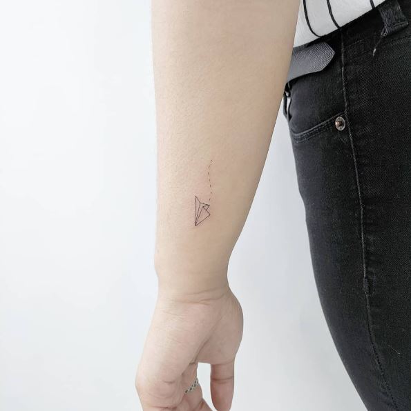 Mini Paper Plane Hand Tattoo