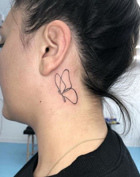 Minimalist Butterfly Tattoo Behind the Ear