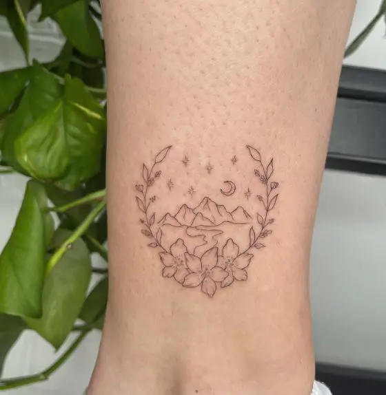 Mountain and Floral Leaf Tattoo