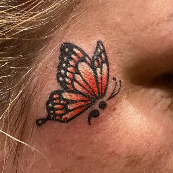 Orange Semicolon Butterfly Face Tattoo