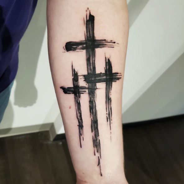 Painted Crosses Forearm Tattoo