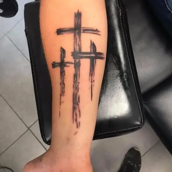 Paint Stroke Three Cross Forearm Tattoo