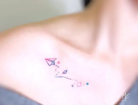 Paper Plane Travelling around with Stars and Saturn Tattoo Piece