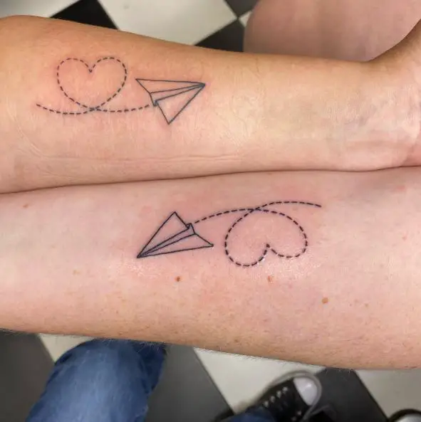 Paper Plane and Heart Shaped Lines Forearm Tattoo