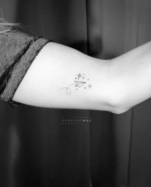 Paper Plane with Sparks Arm Tattoo