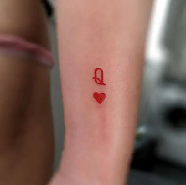 Q and Heart Red Ink Tattoo Piece