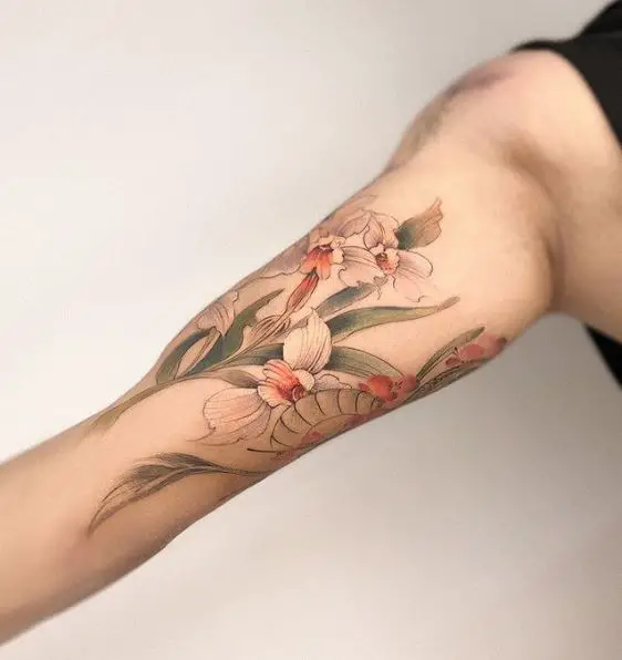 Realistic Orchid and Green Leaves Arm Tattoo