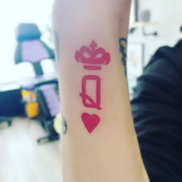 Red Ink Queen of Hearts Tattoo