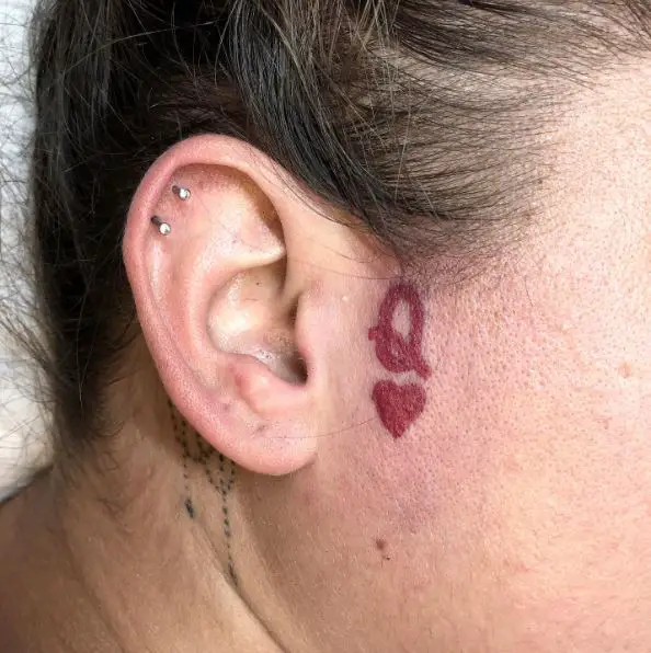 Red Queen of Hearts Face Tattoo