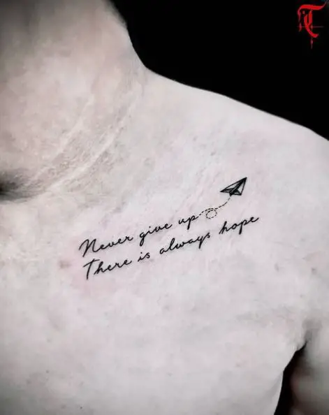 Scriptures with a Paper Plane Chest Tattoo
