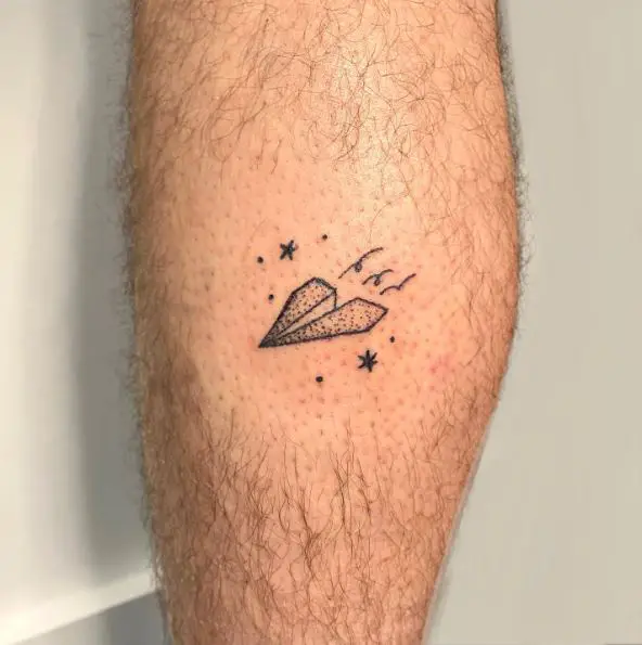Simple Dot Work Paper Plane with Stars Leg Tattoo