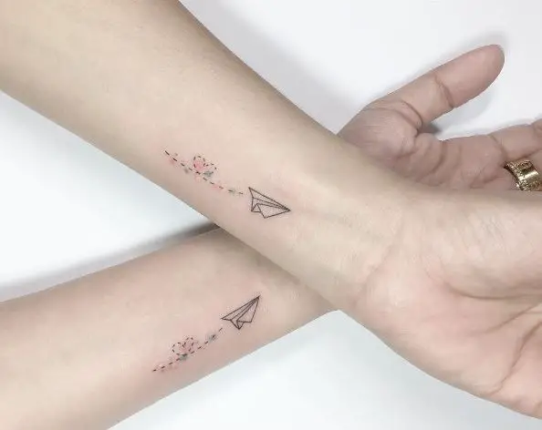 Simple Paper Plane Tattoo with Rainbow Colored Heart