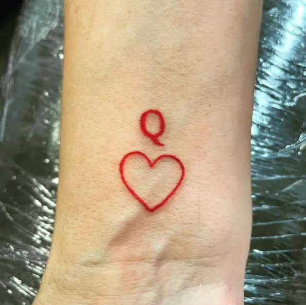 Simple Queen of Hearts Line Tattoo
