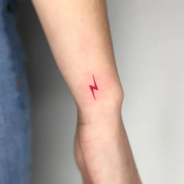 Simple Red Lightning Bolt Wrist Tattoo