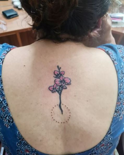 Simple and Delicate Pink Orchid Flower Back Tattoo