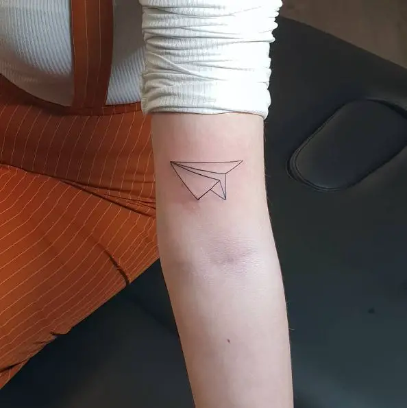 Small Paper Plane Line Tattoo