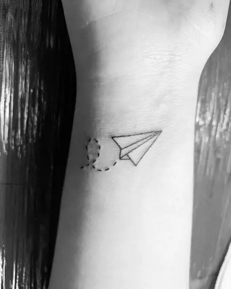 Small Paper Plane and Dotted Lines Tattoo Piece
