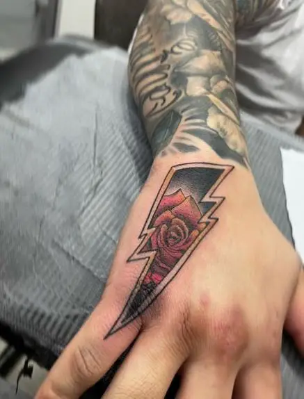 Tattoo of a Rose inside Lightning Bolt