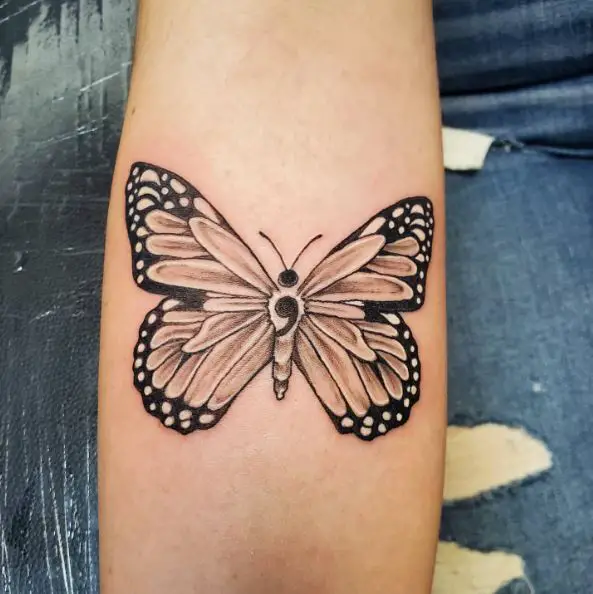 Tattoo of a Semicolon Hidden in a Butterfly Design