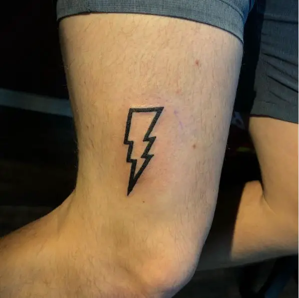 Thick Line Lightning Bolt Thigh Tattoo
