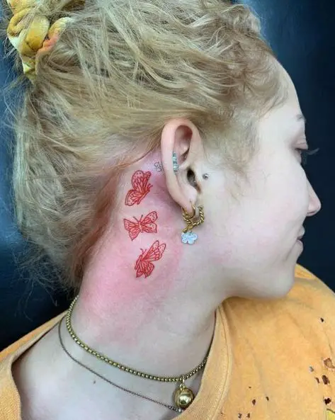 Three Red Butterflies Tattoo Behind the Ear