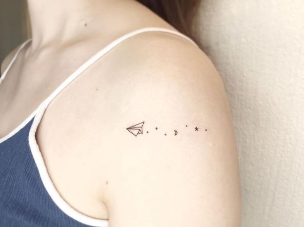 Tiny Paper Plane with Moon and Star Arm Tattoo