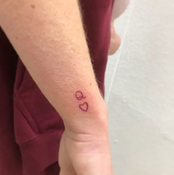 Tiny Queen of Hearts Tattoo