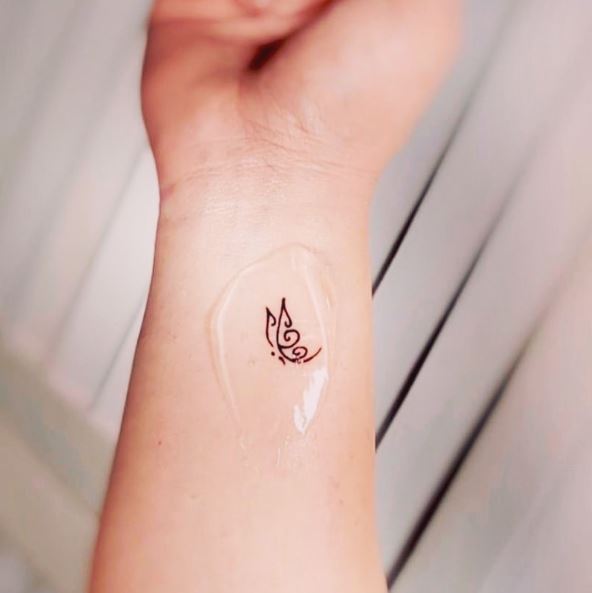 Tiny Semicolon Butterfly Wrist Tattoo