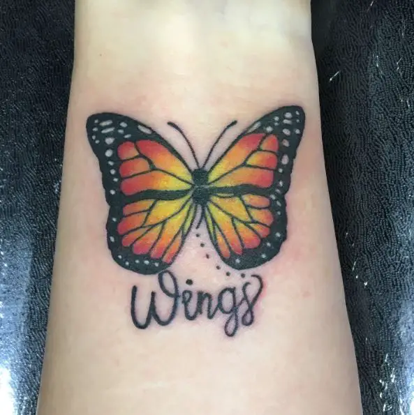 Yellow and Orange Semicolon Butterfly with a Text Wrist Tattoo