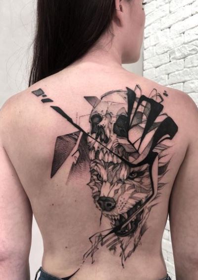 Black and Grey Skull and Wolf Back Tattoo