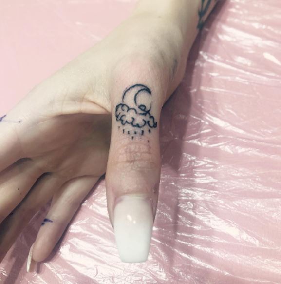 Moon and Rainy Cloud Knuckle Tattoo