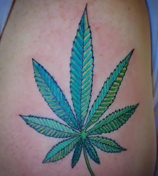 Green Marijuana Leaf Arm Tattoo
