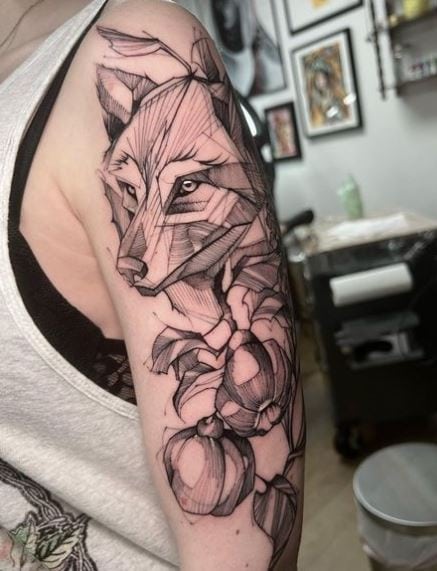 Quinces and Wolf Arm Tattoo