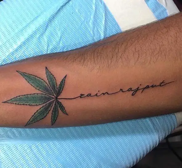 Green Marijuana Leaf with Lettering Forearm Tattoo