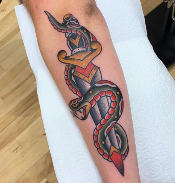 Traditional Dagger and Snake Forearm Tattoo