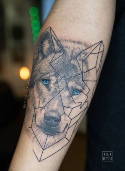 Geometric Wolf with Blue Eyes Forearm Tattoo