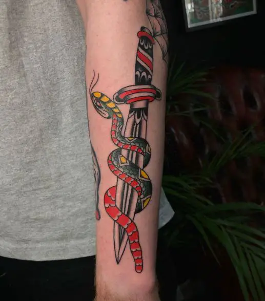 Colored Traditional Dagger and Snake Forearm Tattoo