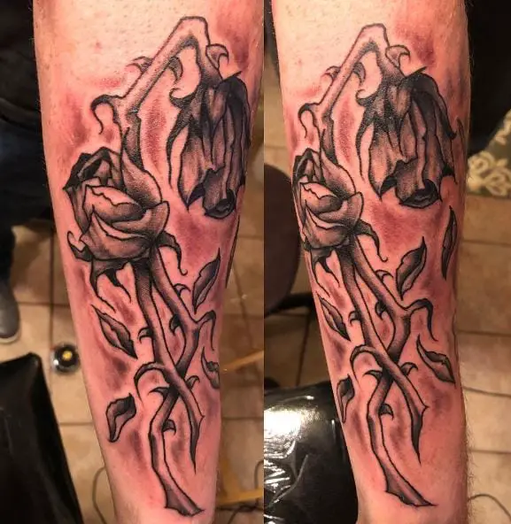 Dead Rose with Falling Petals Forearm Tattoo
