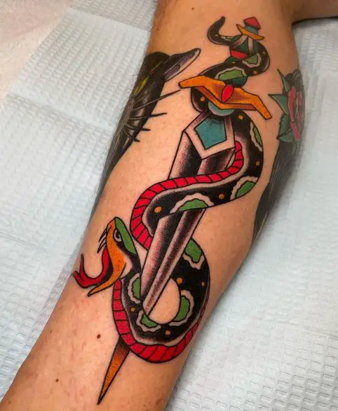 Dagger and Black Snake Calf Muscle Tattoo