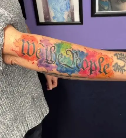 Rainbow Background We the People Forearm Tattoo