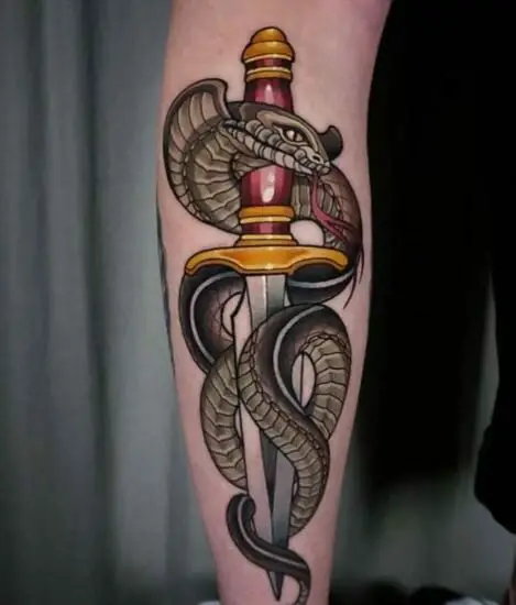 Dagger and Cobra Snake Calf Muscle Tattoo