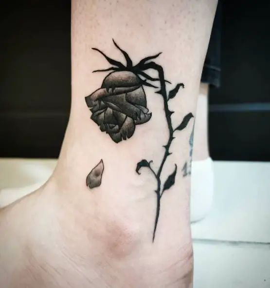 Dead Rose with Falling Petal Ankle Tattoo