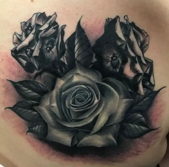 Dead Roses with Bugs Back Tattoo