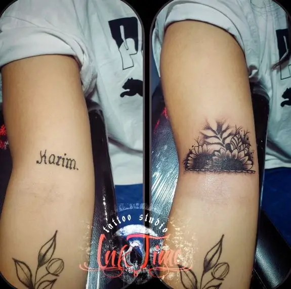 Black and Grey Flowers with Leaves Biceps Tattoo
