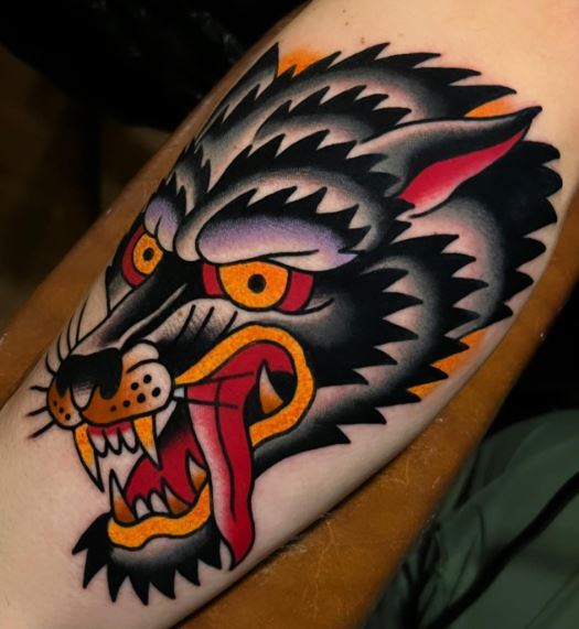 Colored Wolf Head Arm Tattoo